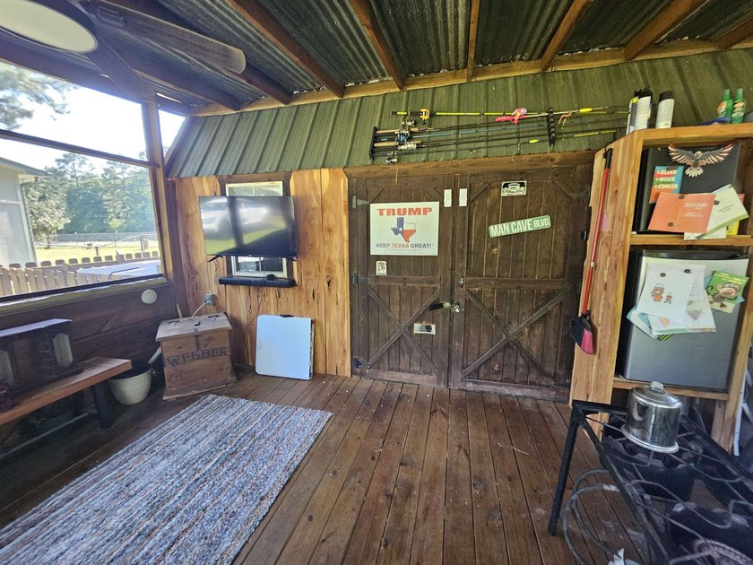 Tucked away in the gated community of Holly Lake Ranch, this - photo 36