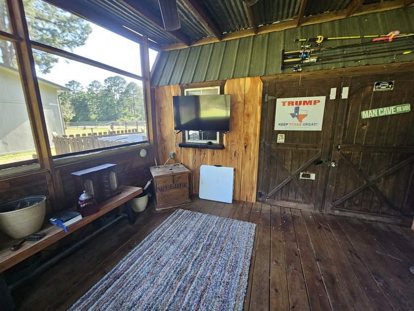 Tucked away in the gated community of Holly Lake Ranch, this - photo 38