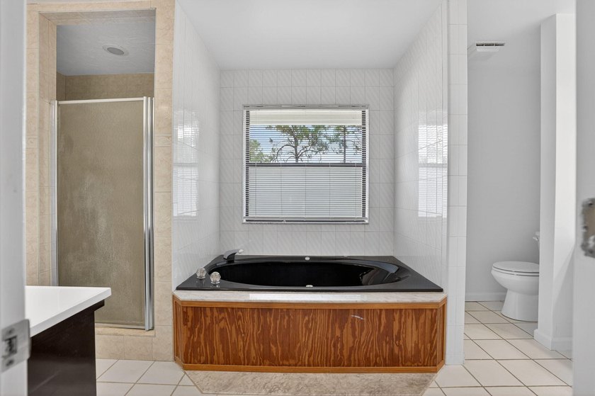 Enjoy peaceful country living in Jupiter Farms with this - photo 14