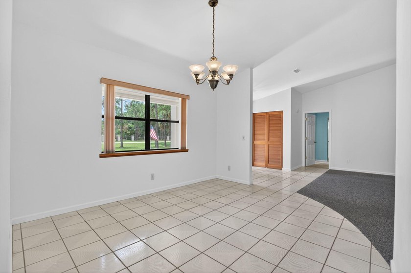 Enjoy peaceful country living in Jupiter Farms with this - photo 18