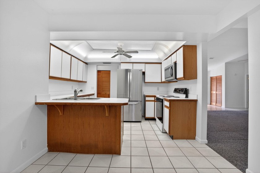 Enjoy peaceful country living in Jupiter Farms with this - photo 23