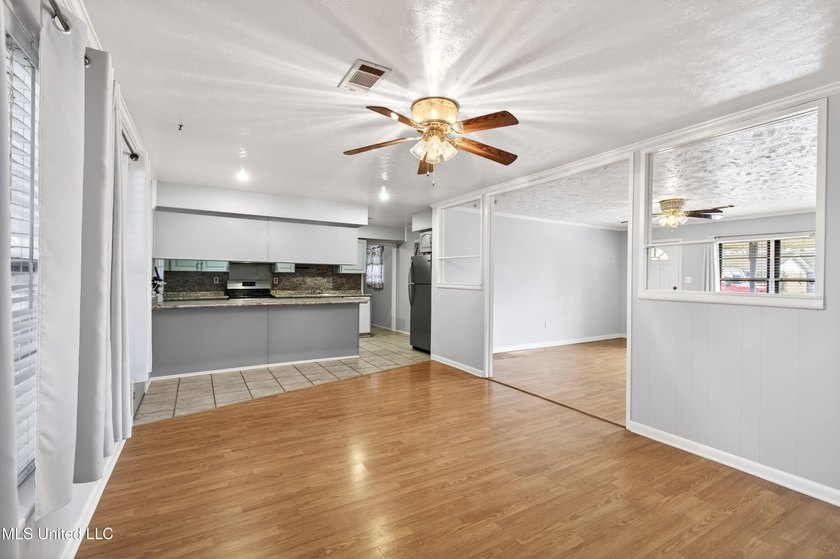 This well-maintained 3-bedroom brick home in Long Beach offers a - photo 9