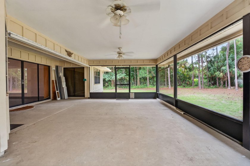 Enjoy peaceful country living in Jupiter Farms with this - photo 29