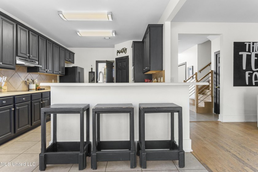 This spacious five-bedroom, three-and-a-half-bath - photo 13
