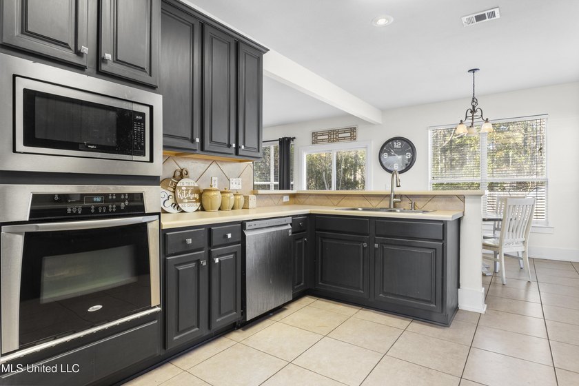 This spacious five-bedroom, three-and-a-half-bath - photo 14