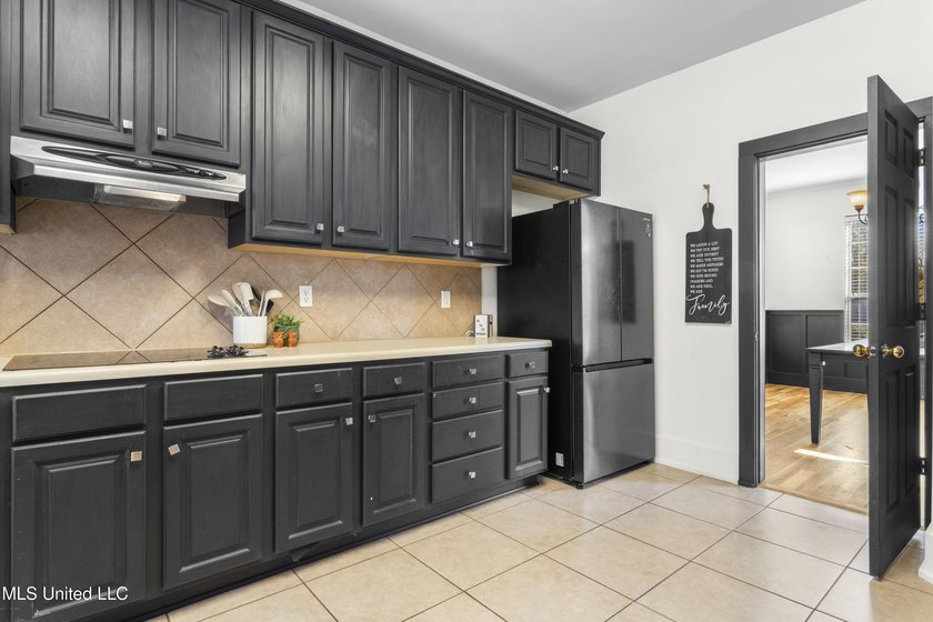 This spacious five-bedroom, three-and-a-half-bath - photo 16