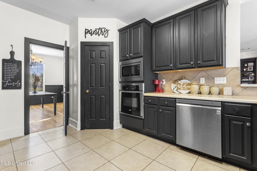 This spacious five-bedroom, three-and-a-half-bath - photo 17
