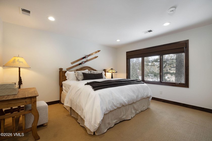 Strategically positioned along the banks of Gore Creek, this - photo 19