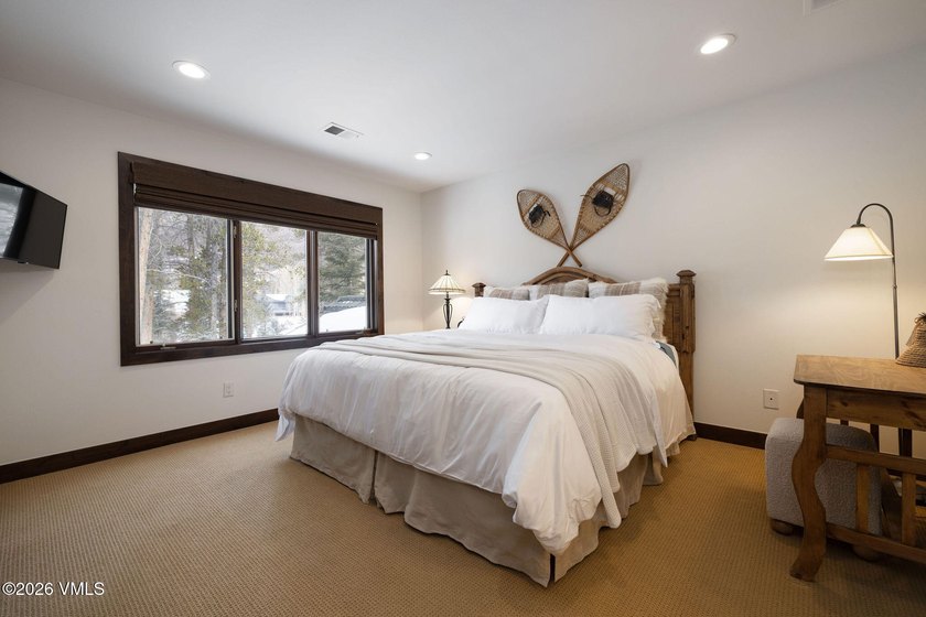 Strategically positioned along the banks of Gore Creek, this - photo 21