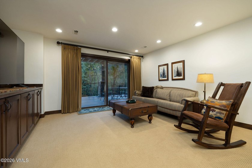 Strategically positioned along the banks of Gore Creek, this - photo 24