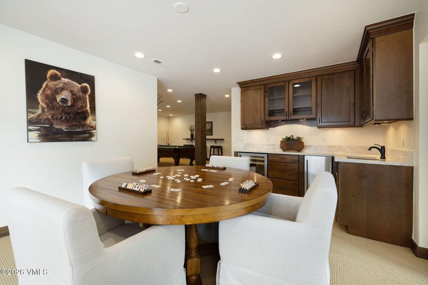 Strategically positioned along the banks of Gore Creek, this - photo 26