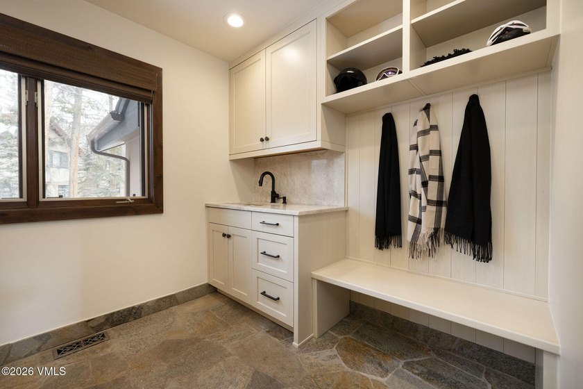 Strategically positioned along the banks of Gore Creek, this - photo 33