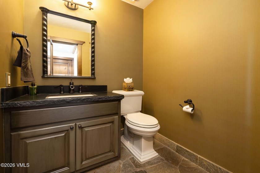 Strategically positioned along the banks of Gore Creek, this - photo 35