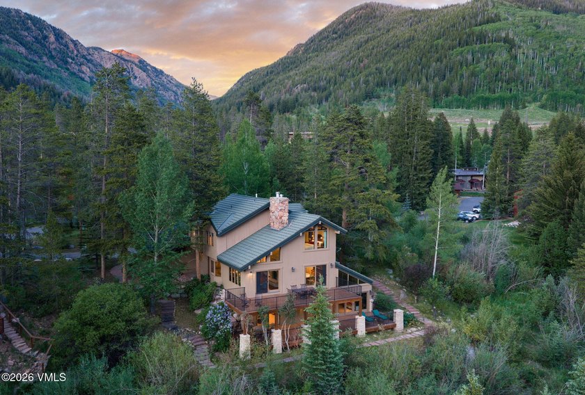 Strategically positioned along the banks of Gore Creek, this - photo 40