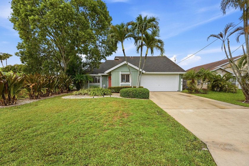 Welcome to this charming single-story residence in North Palm - photo 2