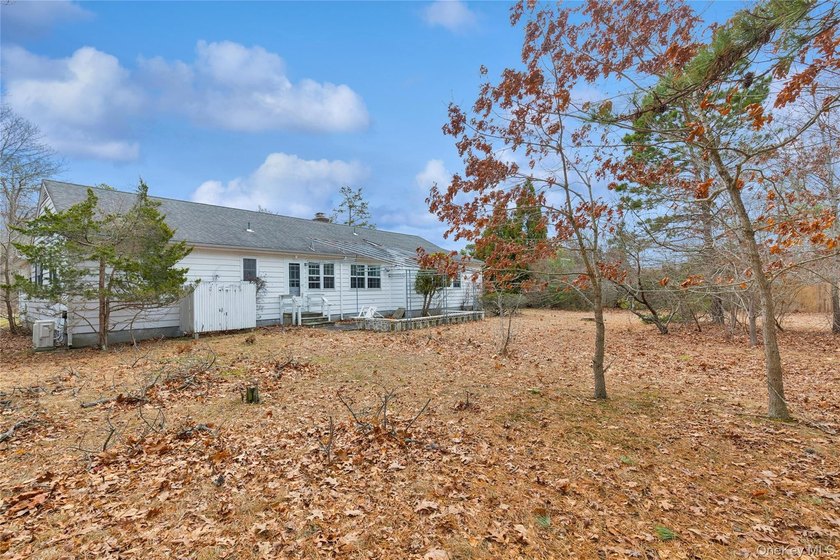 Located in the Rampasture Point section of Hampton Bays, this - photo 25