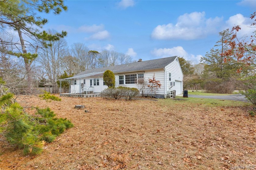 Located in the Rampasture Point section of Hampton Bays, this - photo 27