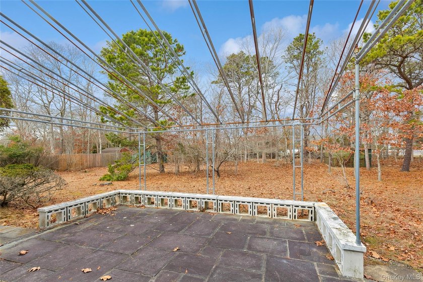 Located in the Rampasture Point section of Hampton Bays, this - photo 30