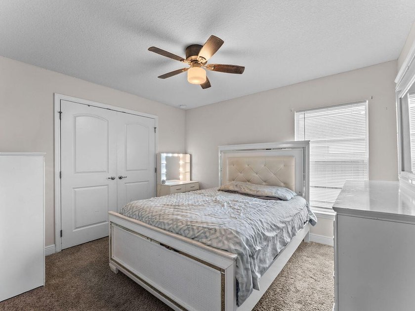 Welcome to this stunning and meticulously maintained 4-bedrm + - photo 2