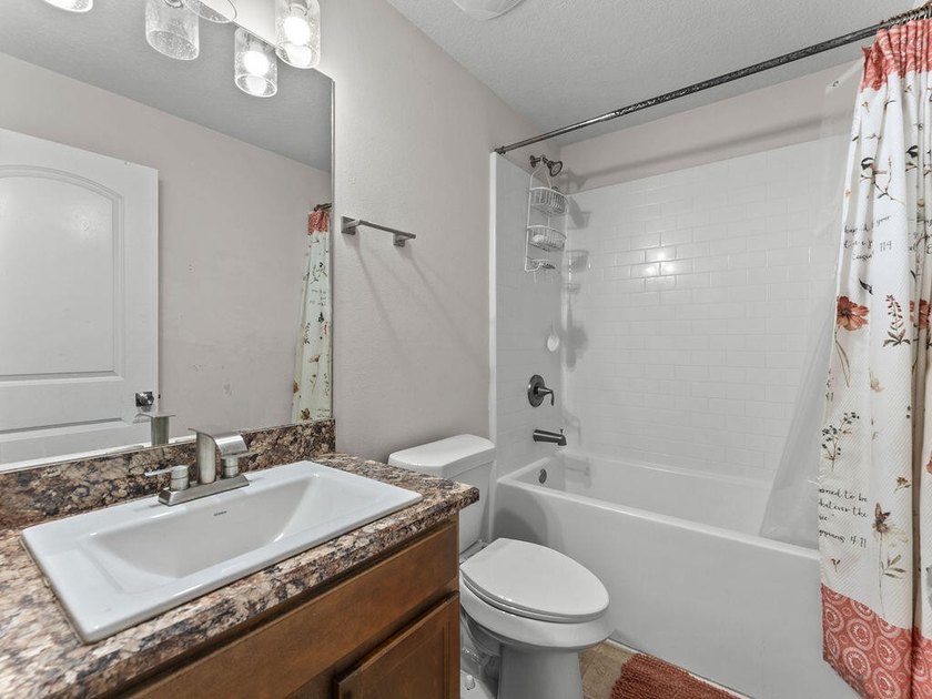 Welcome to this stunning and meticulously maintained 4-bedrm + - photo 3