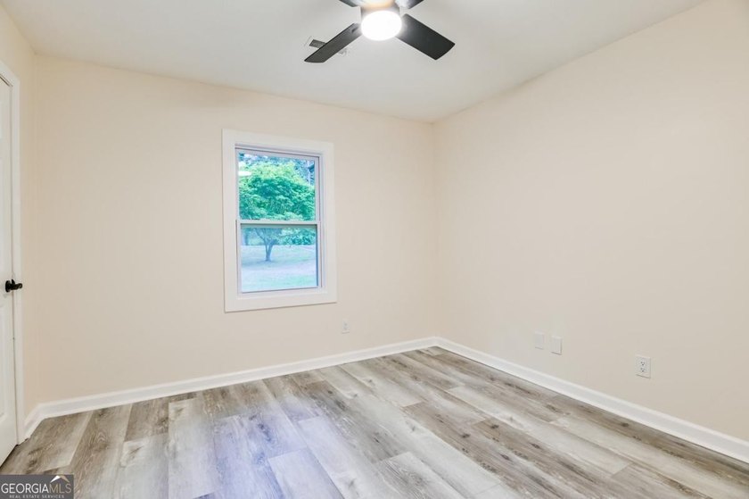Beautifully renovated 3-bedroom, 2-bath brick ranch on nearly - photo 22