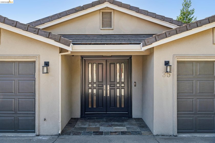 Tucked into a private cul-de-sac in Oakland Hills' coveted - photo 3