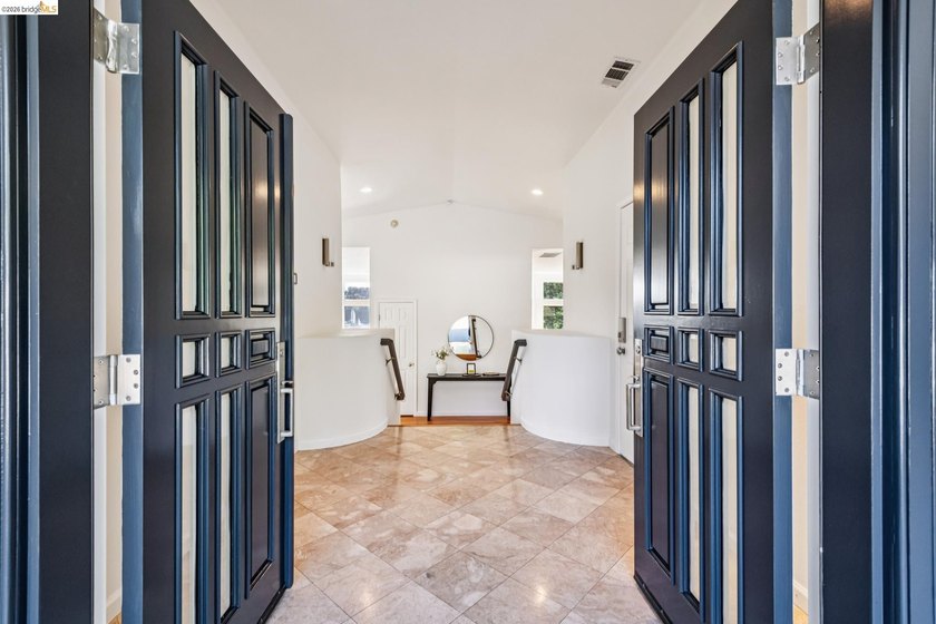 Tucked into a private cul-de-sac in Oakland Hills' coveted - photo 4
