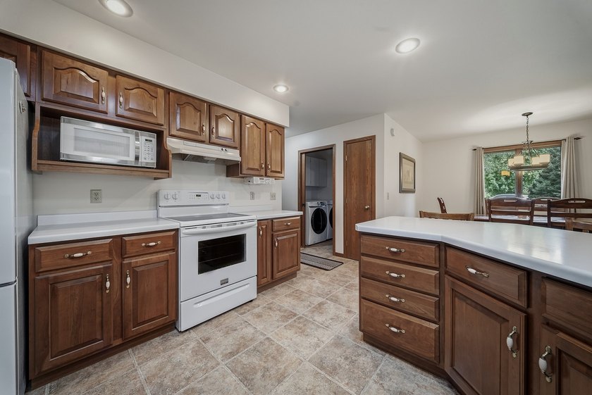 Beautifully maintained and set on a corner lot, this ranch-style - photo 13