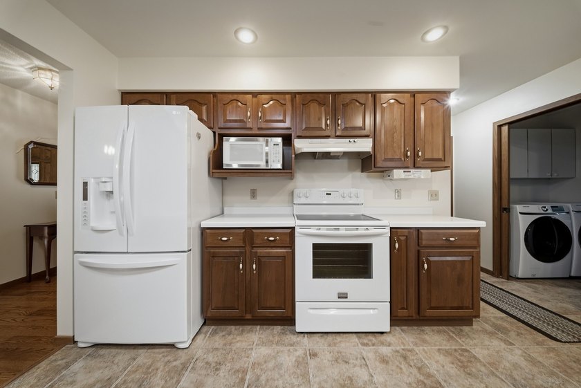 Beautifully maintained and set on a corner lot, this ranch-style - photo 14