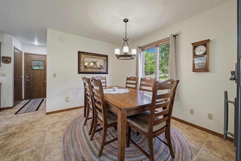 Beautifully maintained and set on a corner lot, this ranch-style - photo 16