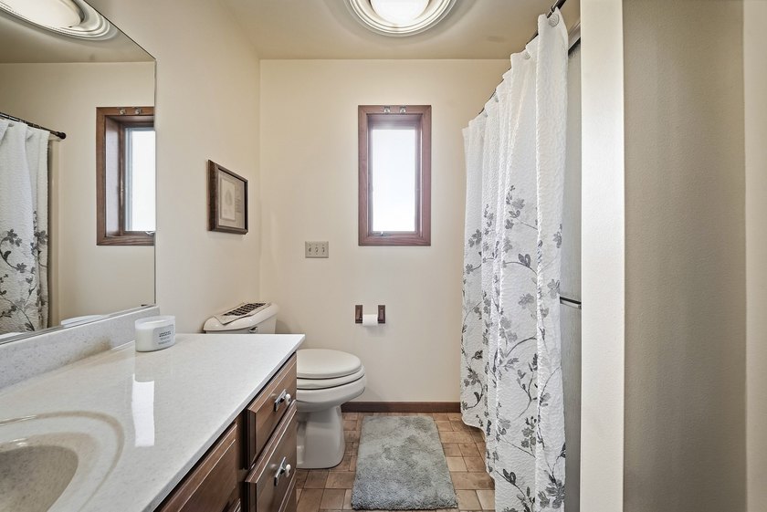 Beautifully maintained and set on a corner lot, this ranch-style - photo 22