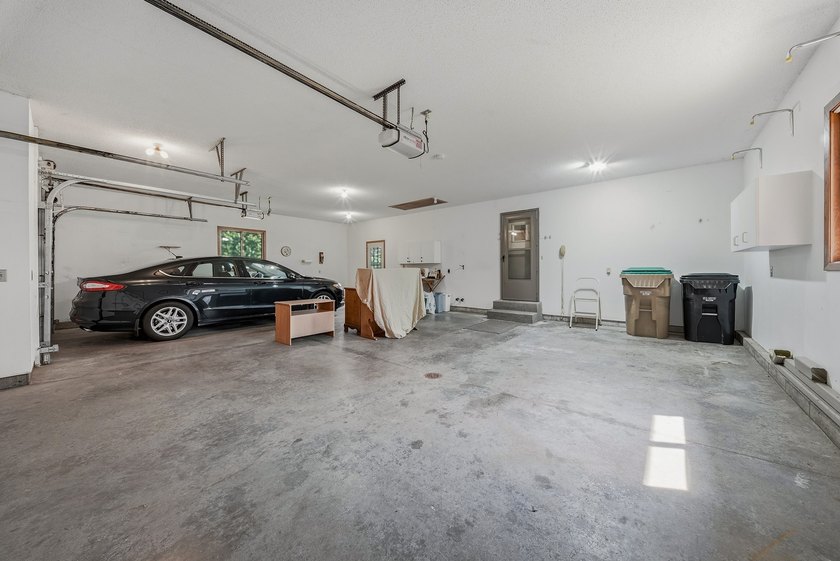 Beautifully maintained and set on a corner lot, this ranch-style - photo 34