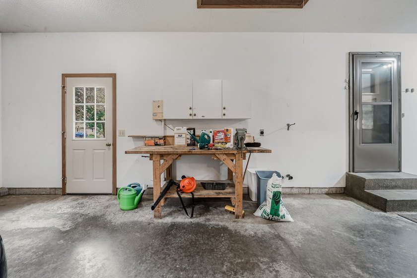 Beautifully maintained and set on a corner lot, this ranch-style - photo 35