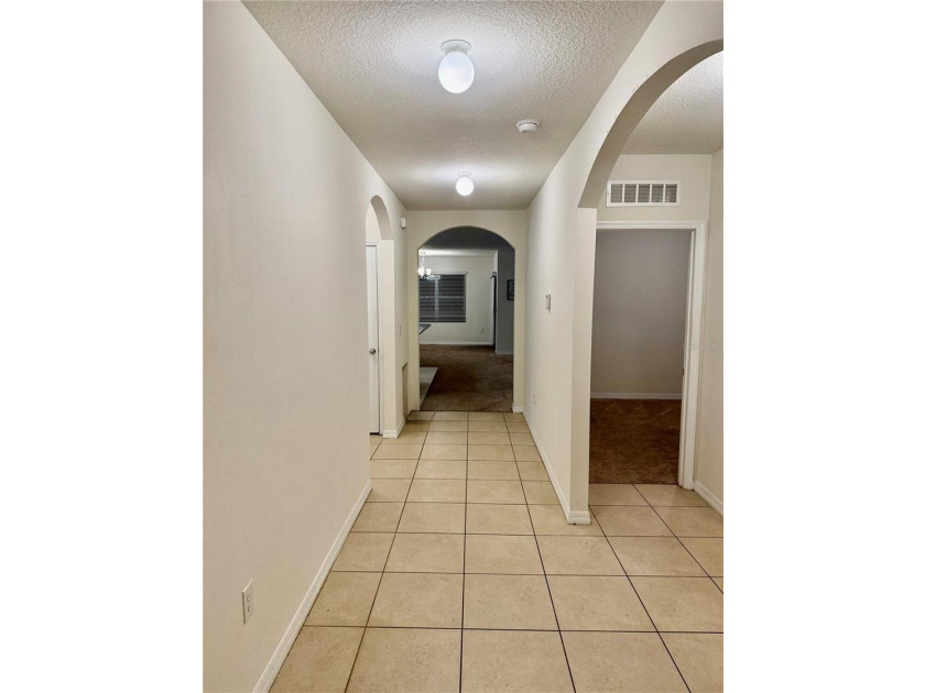 This charming 3-bedroom, 2-bath home features a spacious - photo 2