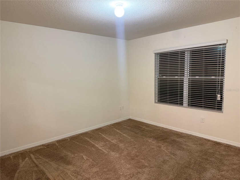 This charming 3-bedroom, 2-bath home features a spacious - photo 7