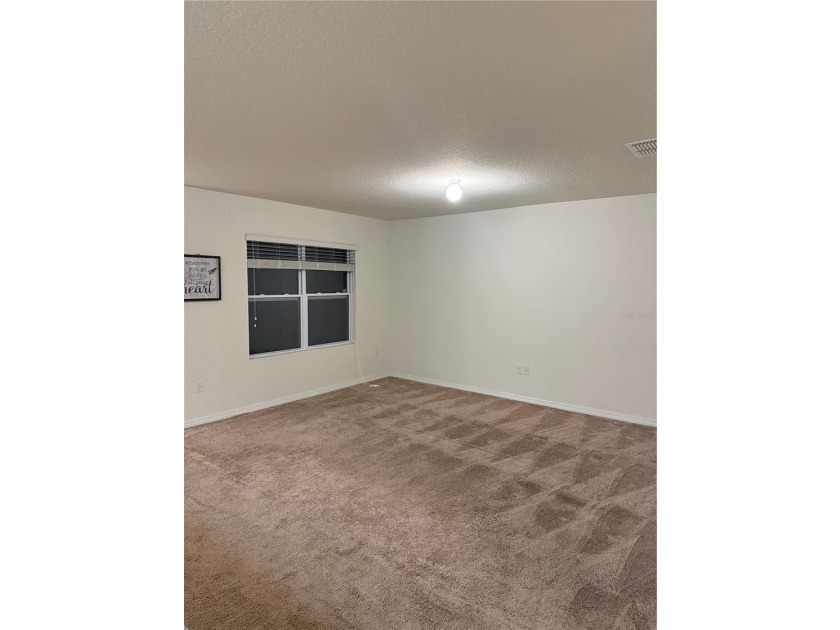 This charming 3-bedroom, 2-bath home features a spacious - photo 9