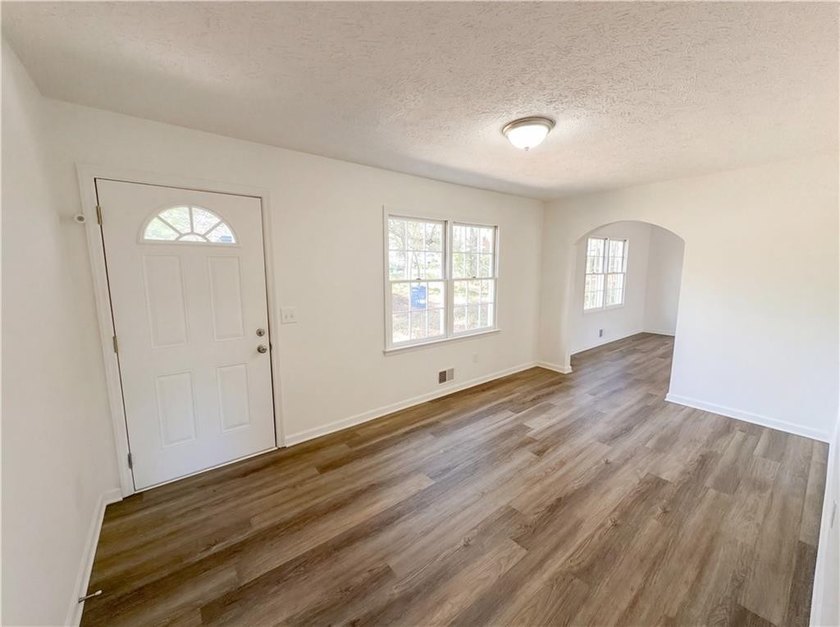 Welcome to 2006 Chelsea Ln, a home that exudes warmth and - photo 8