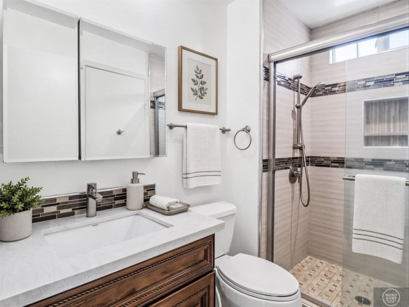 Welcome to this beautifully updated 3 bedroom, 2 bath residence - photo 18