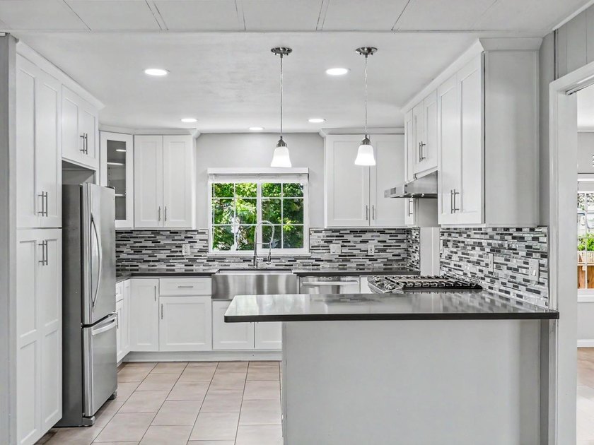 Welcome to this beautifully updated 3 bedroom, 2 bath residence - photo 23