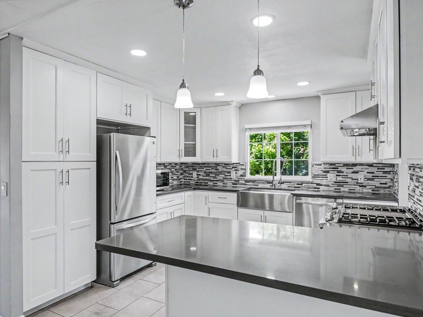 Welcome to this beautifully updated 3 bedroom, 2 bath residence - photo 24