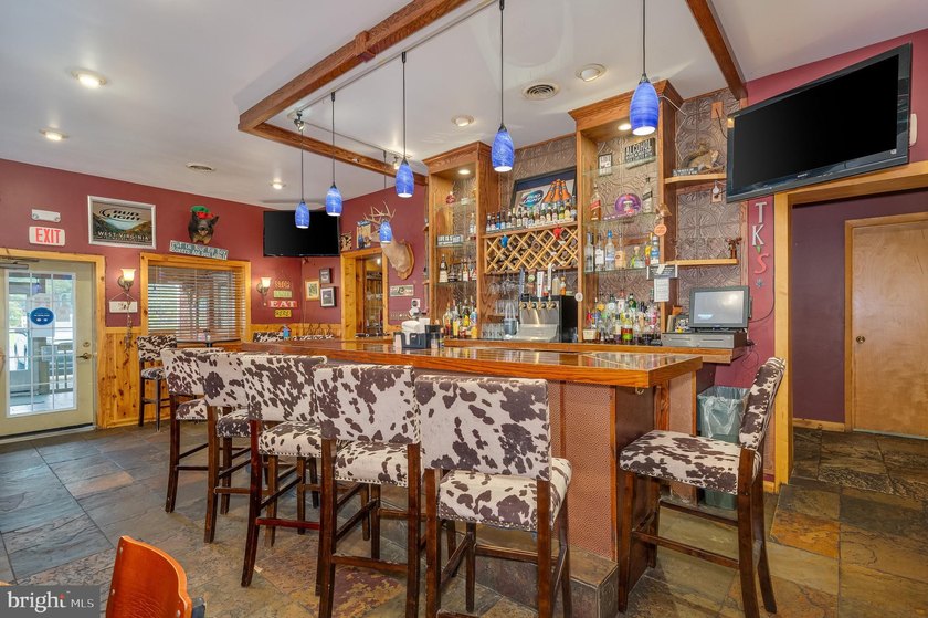 We are excited to present the Lost River Grill and Motel and - photo 35