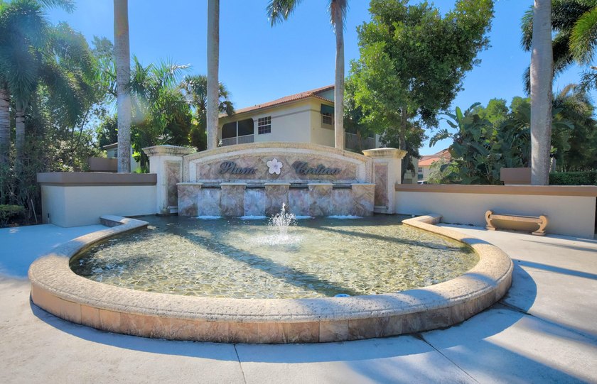 This Cortina home in the non-mandatory Boca Pointe Country Club - photo 2