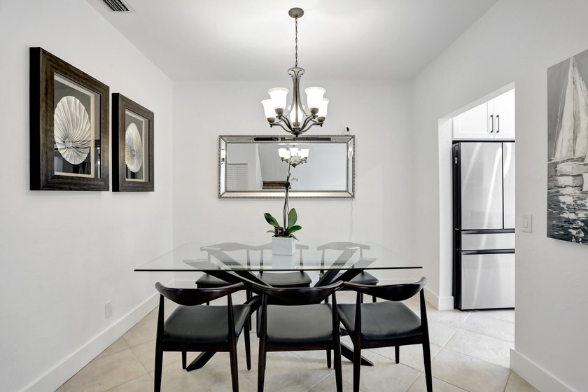 This Cortina home in the non-mandatory Boca Pointe Country Club - photo 4