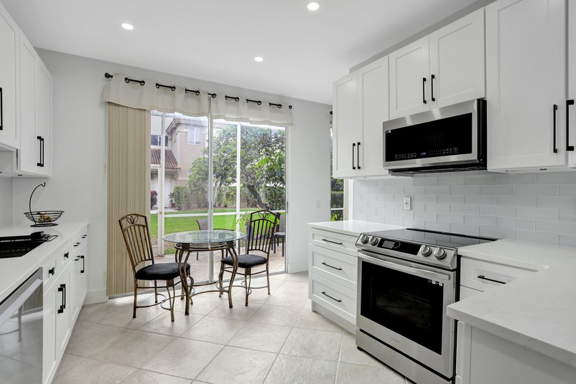 This Cortina home in the non-mandatory Boca Pointe Country Club - photo 5