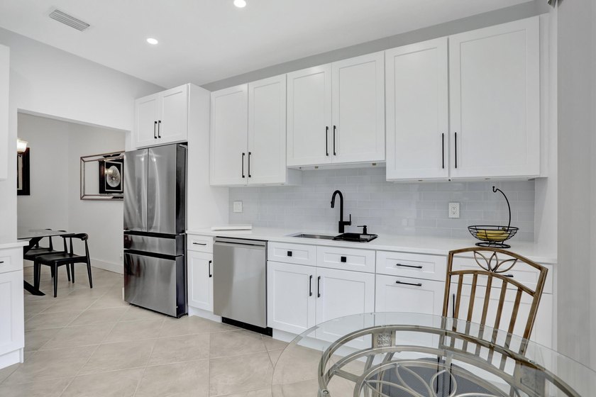 This Cortina home in the non-mandatory Boca Pointe Country Club - photo 6