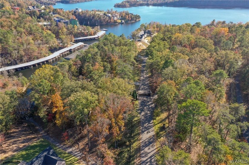 Discover a rare opportunity to own 1.21 +/- acres of lakefront - photo 11