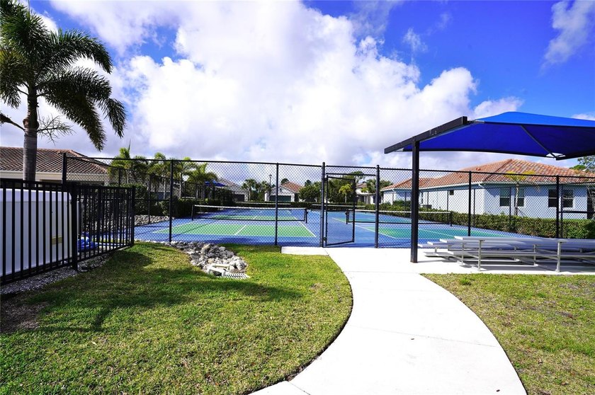 This pristine waterfront 3/2/3 car garage is a breathtaking like - photo 50