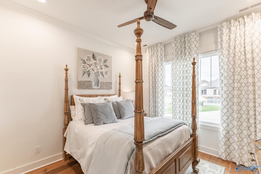 This beautifully designed 4-bedroom home features an open floor - photo 17