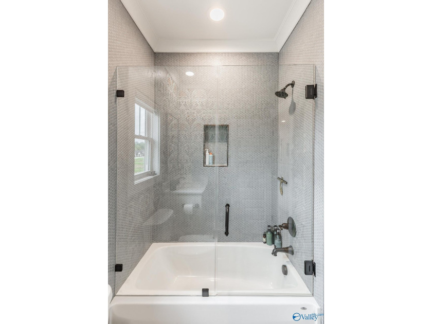 This beautifully designed 4-bedroom home features an open floor - photo 29