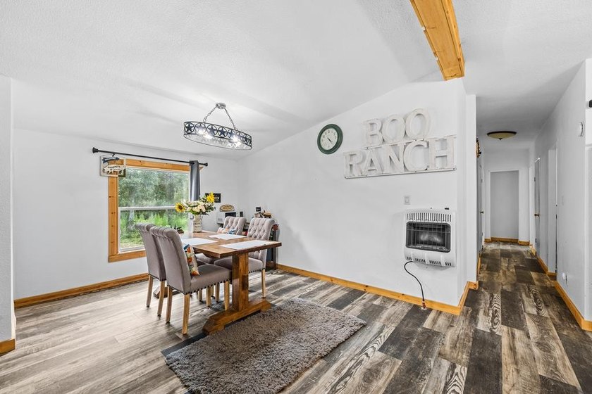 Tucked away among nearly 39 acres of towering timber, this East - photo 11